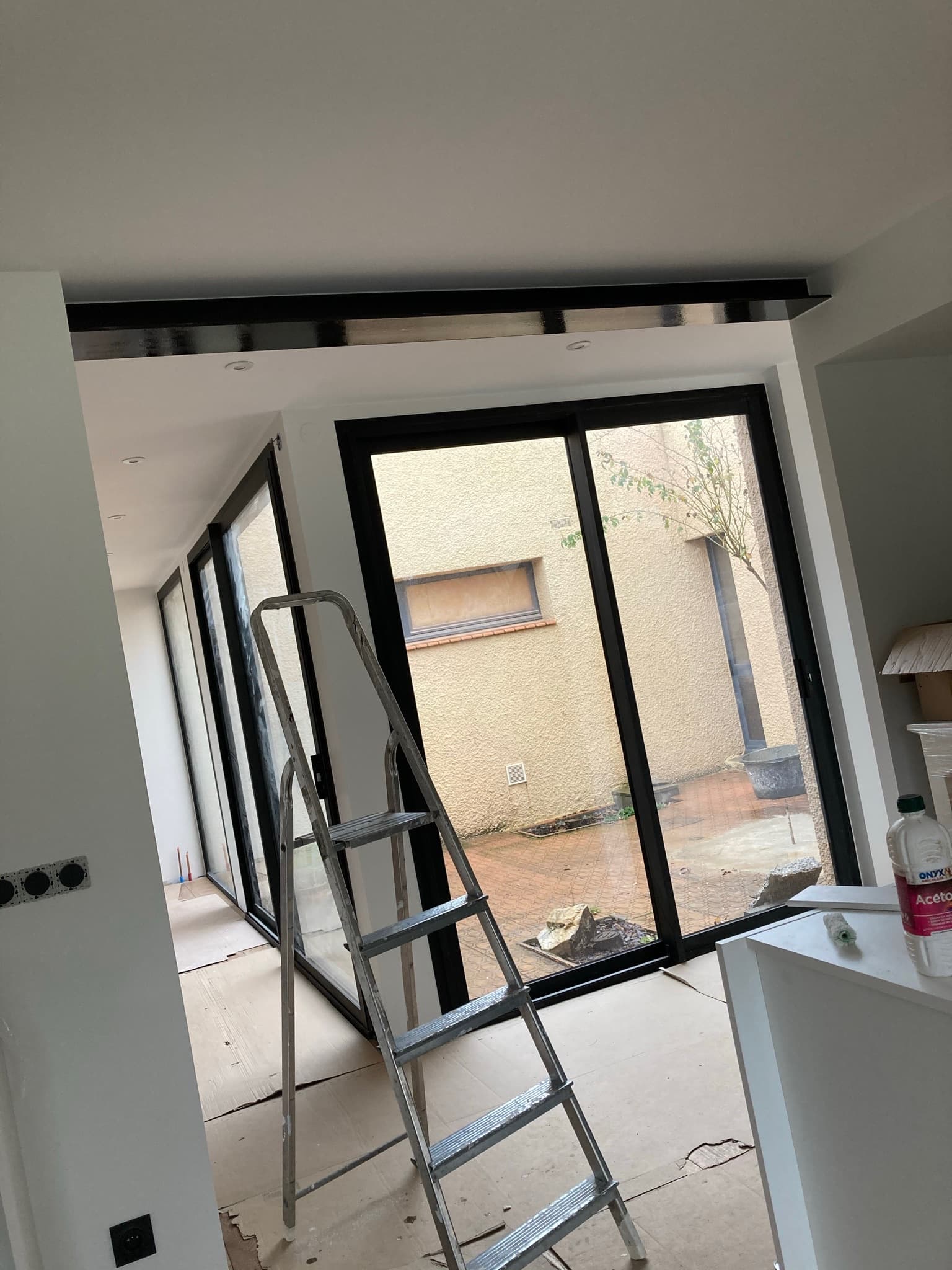 Baie vitrée coulissante 3 vantaux